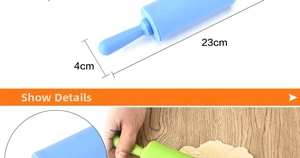Detail of 23cm silicone rolling pin showing dimensions and usage on wooden surface