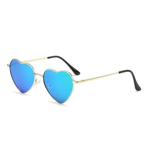 Fashionable heart-shaped sunglasses with gold metal frame and blue reflective lenses