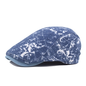Classic washed denim newsboy cap with marble blue and white pattern for casual style