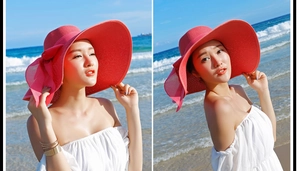 Detalle de sombrero de sol rojo con ala ancha y lazo grande en fondo de playa