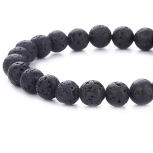 Handmade black lava stone beaded bracelet featuring natural porous texture and round beads
