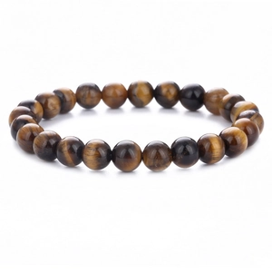 Polished yellow tiger eye stone beaded bracelet with natural brown luster and texture