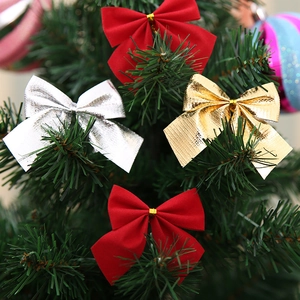 Nœuds de Noël en velours rouge et finitions métalliques or et argent pour décoration