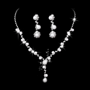 Elegant bridal jewelry set featuring a sunflower rhinestone and pearl necklace with earrings