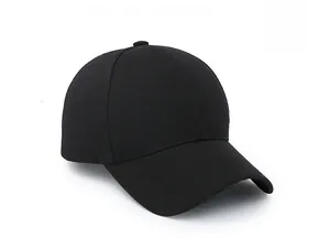 Side view detail of a plain black cotton baseball cap with classic six-panel structure