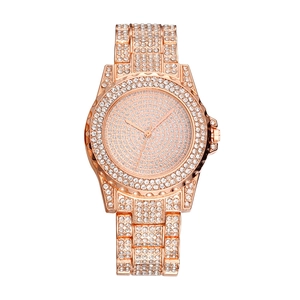 Orologio lusso donna oro rosa con quadrante tempestato di diamanti e cinturino in metallo