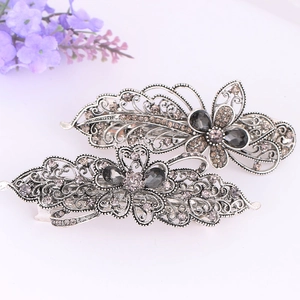 Retro crystal ponytail hair clips with antique silver finish and grey rhinestones set