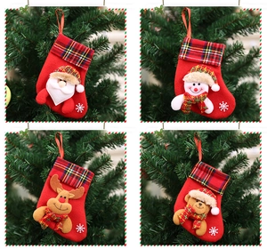 Detailed grid of four festive Christmas stockings featuring 3D Santa, Snowman, Reindeer, and Bear