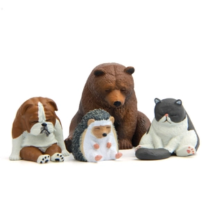 Set of 4 cute resin sleeping animal figurines featuring a bear, bulldog, cat, and hedgehog