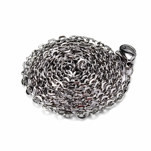 Detailed view of polished stainless steel link chain with a lobster clasp closure