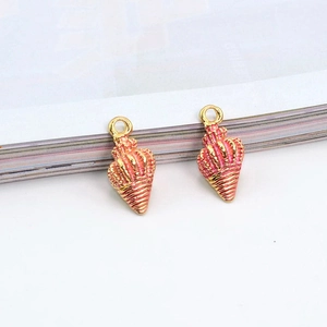 Detail of pink enamel seashell pendants with gold-plated alloy finish for DIY jewelry
