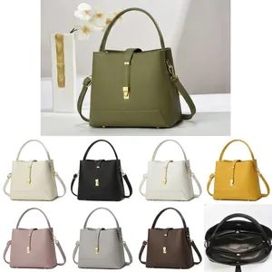 Detailed dimension guide for the leather handbag showing length 23cm, width 12cm, height 21cm