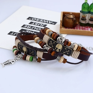 Retro multi-layer leather bracelet set with skull charms and beaded punk details