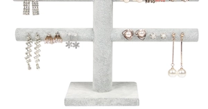Detail of velvet T-bar earring display stand with rhinestone tassels and pearl studs