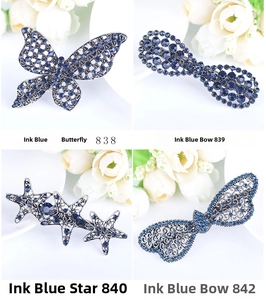 Detailed set of vintage alloy hair clips with dark blue rhinestones in butterfly shapes