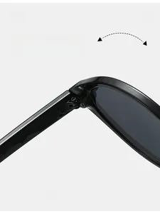 Macro view of durable reinforced metal hinge on black cat-eye sunglasses frame