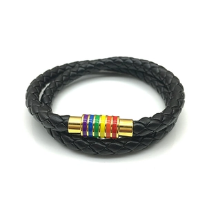 Detail view of black braided leather wrap bracelet with rainbow magnetic clasp mechanism