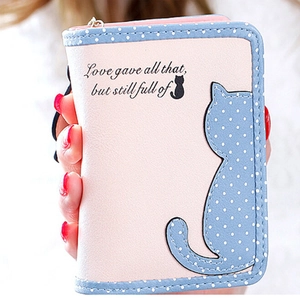 Cute pink women's short wallet with blue polka dot cat silhouette and printed quote