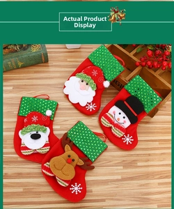 Detail of four Christmas stockings with Santa, Snowman, Bear, and Reindeer plush figures