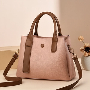 Pink and brown contrast leather tote bag for women with crossbody strap and gold hardware