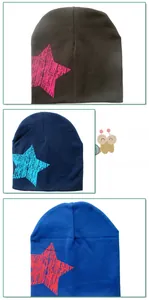 Detailed knit patterns and star prints on navy, royal blue, and black baby beanies