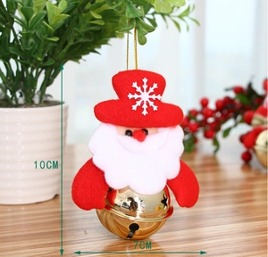 Detailed view of Santa bell ornament featuring red felt hat and golden star cutout bell