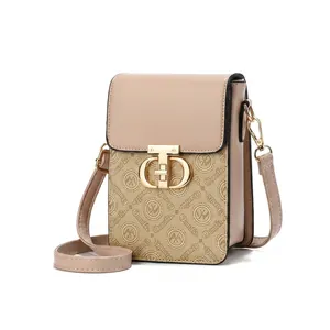 Detailed view of women's vintage monogram crossbody bag with gold CD metal clasp