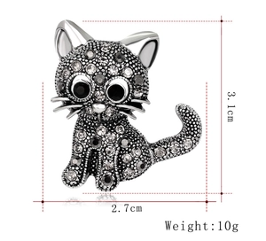 Detailed view of cat brooch dimensions 3.1cm by 2.7cm with sparkling rhinestones