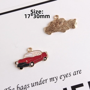 Detail of red car alloy charm 17x30mm with gold-tone drip oil finish for DIY jewelry
