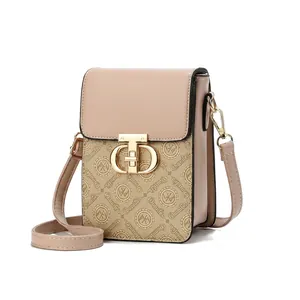 Detail of beige mini crossbody bag showing gold buckle and 13x9x19cm size dimensions