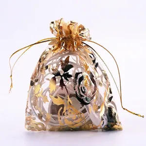 Golden rose pattern organza drawstring gift bag for jewelry storage and small accessories