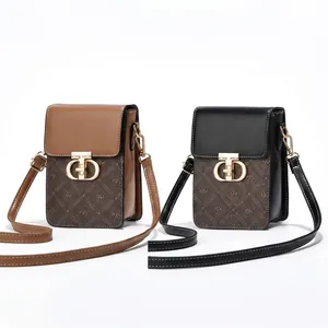 Internal structure showing main pocket and metal CD buckle of mini crossbody phone bag
