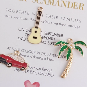 DIY gold alloy charms set featuring white guitar, red car, and green pearl palm tree