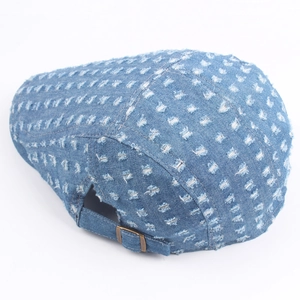 Retro distressed blue denim flat cap with adjustable metal buckle and ripped details