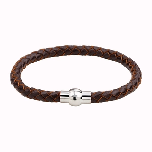 Brown braided leather bracelet for men with a polished silver magnetic clasp on white background
