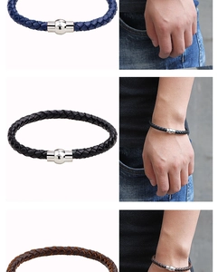 Detail of braided leather bracelet for men with magnetic metal clasp and on-wrist view