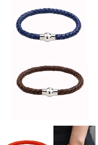 Close-up of woven leather bracelets in multiple colors with secure silver magnetic clasps