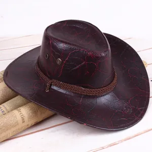 Brown western cowboy hat with leaf texture and woven trim in a 45-degree studio view