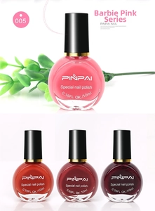 Detail von 10ml Nagellackflaschen in Pink, Rot und Lila mit botanischen Blattakzenten