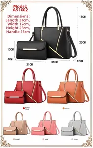 Detail view of the two-piece handbag set featuring V-shaped gold trim and six color options