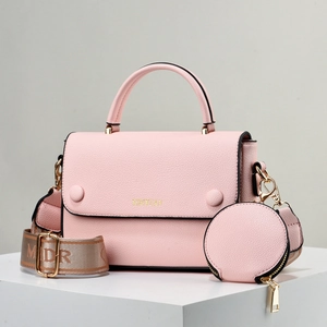 Minimalistische roze crossbodytas van PU-leer met rond muntzakje aan de riem
