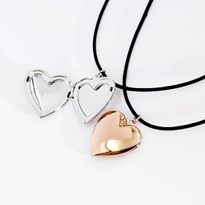 Polished silver and rose gold heart floating lockets in open and closed views