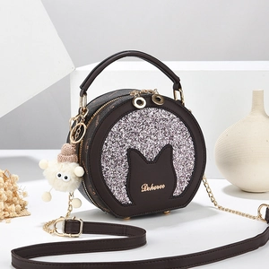 Borsa rotonda marrone con paillettes rosa, decoro orecchie di gatto e ciondolo peluche
