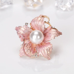 Exquisite pink flower brooch with large pearl center and glitter petals on gold base