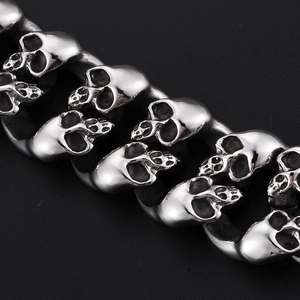 Punk style silver skull bracelet in stainless steel with thick metal chain details