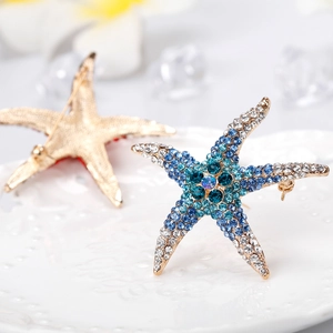 Exquisite gold starfish brooch with sparkling multi-color blue rhinestones and crystals