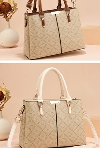 Detail van de monogram tote bag met verstelbare riem en hoogwaardige metalen afwerkingen