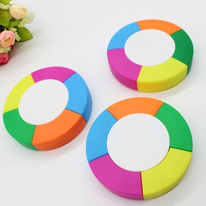 Flat lay view of five-color flower shaped highlighters in pink blue orange green and yellow