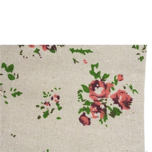Macro detail of beige cotton linen fabric with pink and red floral rose print patterns
