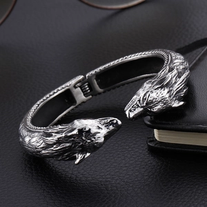 Bracelet jon jonc ouvert en acier inoxydable avec têtes de loup style vintage